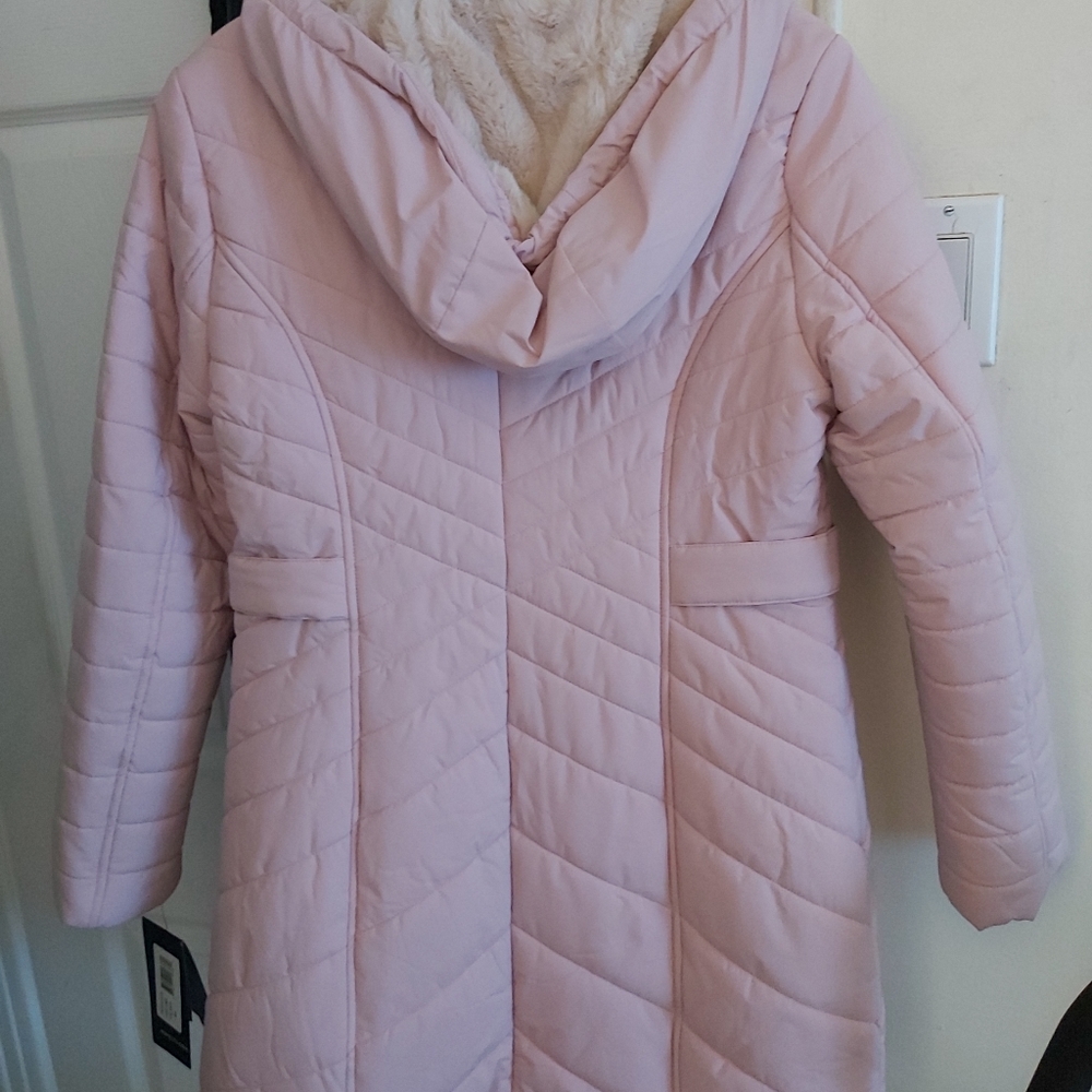 Brand new woman's winter coat pink.